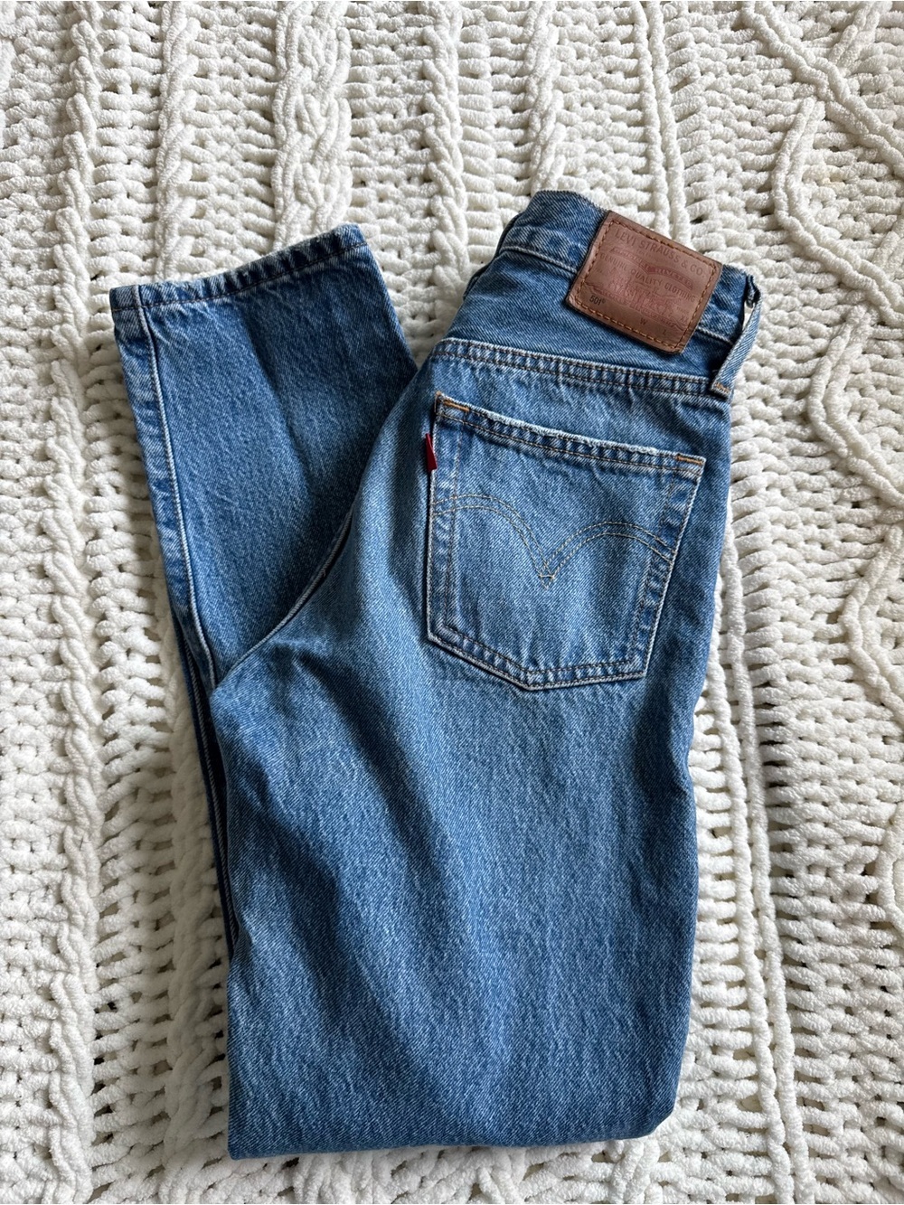 Levi's Genuine Quality Classic Blue Denim Jeans with distressed knee